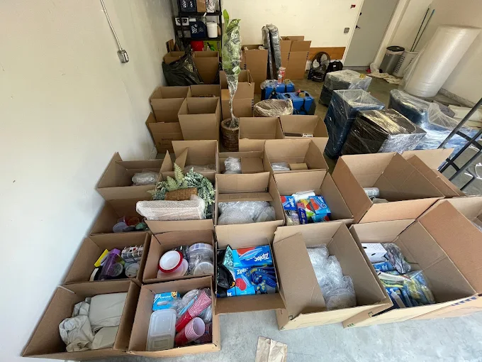 Belongings boxed and organized for secure pack out storage